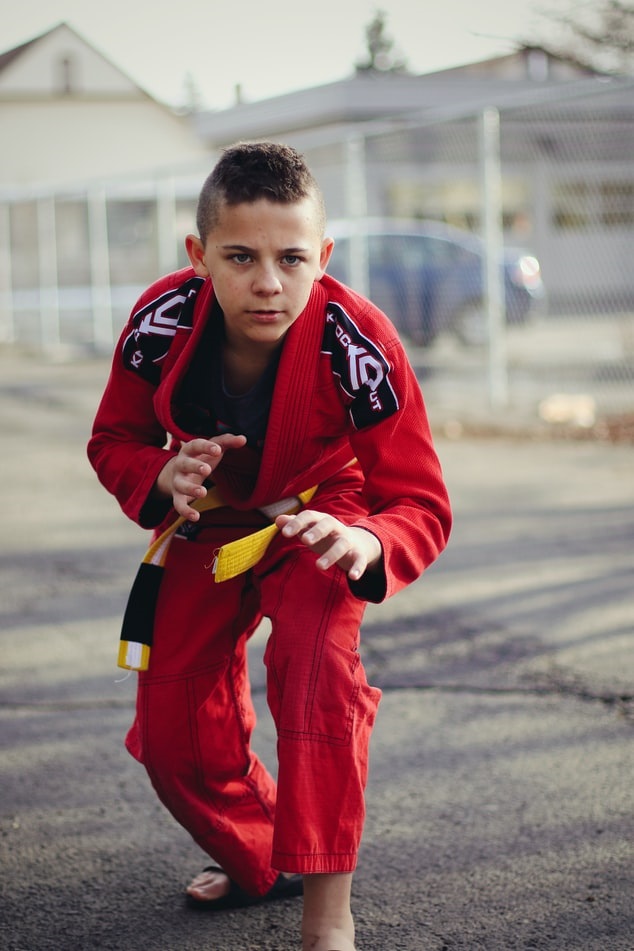 Young MMA fighter in training